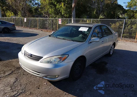 2003 Toyota Camry Xle z USA, uszkodzony, nr VIN 4T1BE32K23U181217